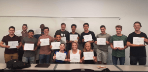 GCU Students holding up their certificates of completion